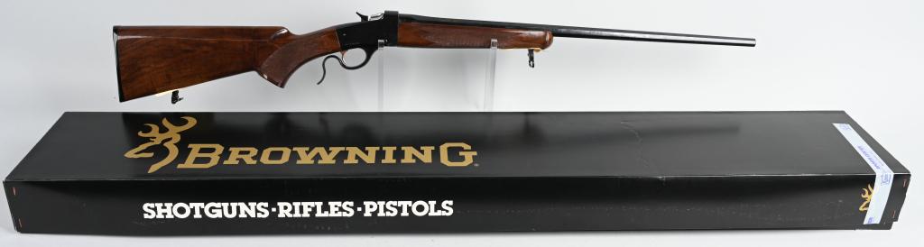 BOXED BROWNING M1885 FALLING BLOCK 22 HORNET RIFLE: SERIAL: 04721NV2L7 BARREL: 24" CALIBER: .22 HORNET ONLY. Features octagon barrel, gold tone trigger, Browning "super swivels," no sights. Comes in original factory box with matching SN and specs of th
