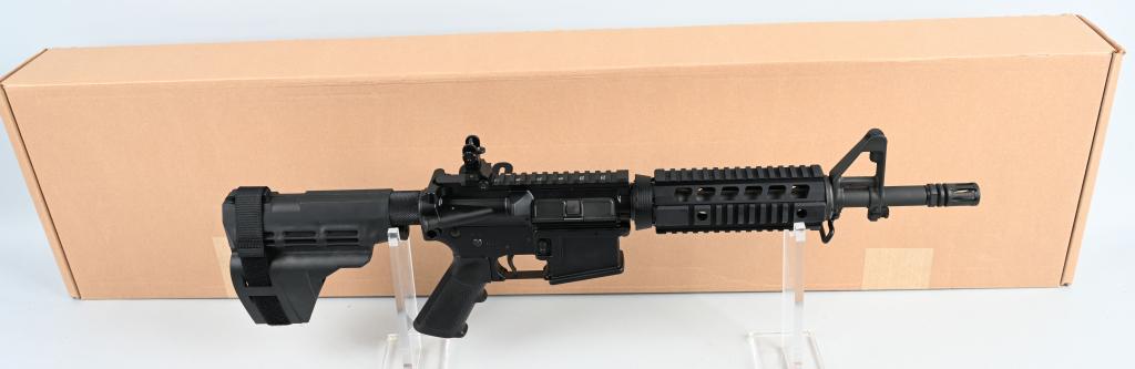 BOXED SIG SAUER M400 SEMI AUTO AR 5.56 PISTOL: SERIAL 20C077377. BARREL: 13" CALIBER: 5.56 NATO. AR Pistol with wrist brace and buffer tube cover. Features USGI style flash suppressor, bayonet lug, quad Picatinny rails, and equipped with rear flip
