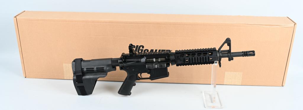 BOXED SIG SAUER M400 SEMI AUTO AR 5.56 PISTOL: SERIAL 20C077376. BARREL: 13" CALIBER: 5.56 NATO. AR Pistol with wrist brace and buffer tube cover. Features USGI style flash suppressor, bayonet lug, quad Picatinny rails, and equipped with rear flip