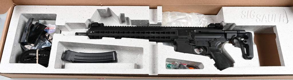 BOXED SIG SAUER MPX SEMI AUTOMATIC 9MM CARBINE: SERIAL 62B026801 BARREL: 16" CALIBER 9MM. Features collapsible stock, flip-up tactical gun sights, Picatinny accessory rails, and comes in original factory cardboard box which has matching SN and spec
