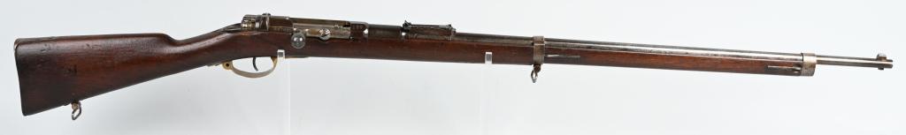 FRENCH MAUSER MODEL 1871 BOLT ACTION RIFLE: SERIAL 75591. BARREL 31" CALIBER.6.5X53.3 mm This rifle is dated 1879. Chamber has the St. Denis stamp. It has matching numbers on frame, bolt and safety. It features full length walnut stock, left si
