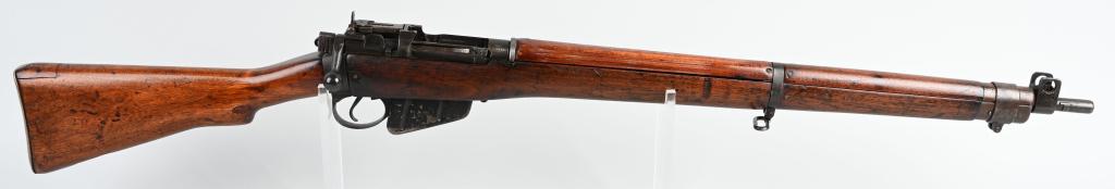 BRITISH ENFIELD NO. 4 MARK 1 MILITARY RIFLE: SERIAL 14263. BARREL 25" CALIBER .303. Introduced in 1931, it was the mainstay military rifle of the British empire during the Second World War. It has the usual dark walnut four piece stock set, blue