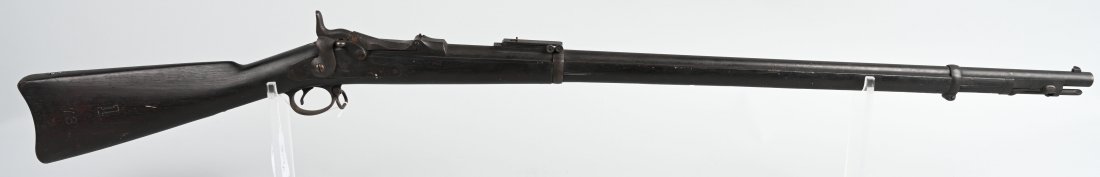 US MODEL 1884 TRAPDOOR SPRINGFIELD RIFLE: SERIAL: 138017. BARREL: 31\" CALIBER: 45-70 YEAR: 1891 Has Ramrod bayonet, cartouche on stock, dated 1891, large \"I\" and \"73\" carved on right side of stock. Sights, original stock, and trigger gua