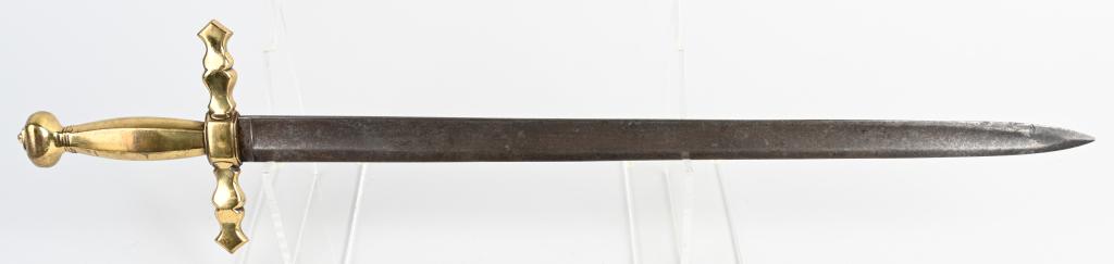 19th CENT. BRASS HILT SHORT SWORD: Interesting sword with large smooth cast brass hilt. Single edge blade is fullered on both sides. The false edge at the ricasso has a markers mark that appears to be "G. Fischer" Blade is 23" by 1 1/4