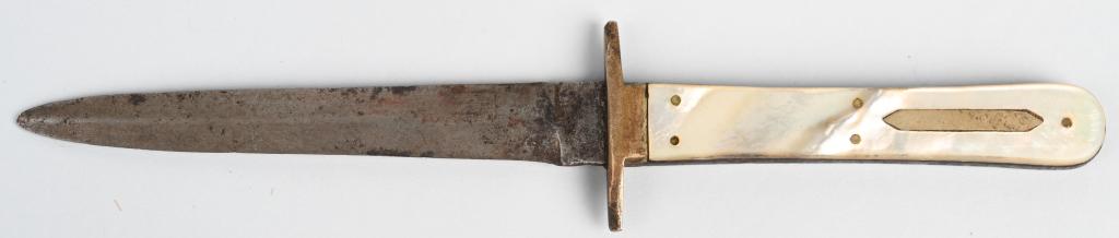 19th CENT. PEARL HANDLE SIDE KNIFE: Mid 19th century side knife measuring 8 3/4" with a 4 1/2" blade. There are traces of makers markings on ricasso. Two edge blade has scattered pitting and old evidence of sharpening. Pearl grip is hel