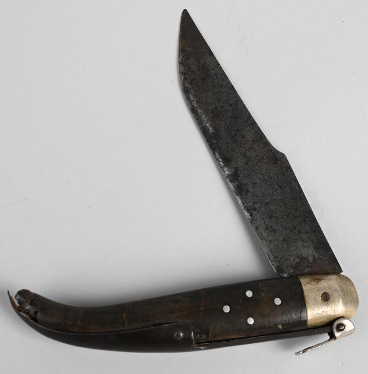 19th CENT. FRENCH BISSET FOLDING KNIFE: Original 19th century French folding knife marked "31 Bisset" on blade. When opened the knife measures 10 1/2" with a 5 1/2" clipped point blade. It measures 6" when closed. Grip is made of horn and t