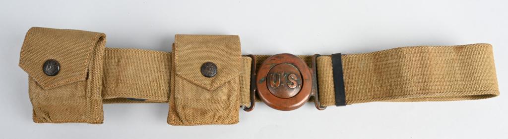 EAGLE SNAP OFFICER GARRISON M1910 BELT W/ POUCHES: WWI Officer's Eagle Snap Adjustable Belt. This is a M1910 Garrison Officers Belt Manufactured by Mills. The belt also comes with two Moon Clips Eagle Snap Pouches for the 1917 Colt as well. An Interme