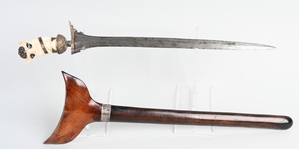 EARLY INDONESIAN KRIS BLADE WITH FIGURAL HANDLE: Early Indonesian style Kris blade knife with wood scabbard and metal footed, bone-carved figural handle. Figure has applied ornamental metal work as well as inlaid red and turquoise stones at the crow