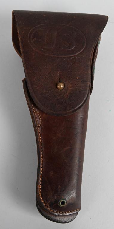 WW1 US ARMY U.S. M1916 COLT PISTOL HOLSTER 1917 DD: Brown leather holster with brass fittings. The top fold-over flap has "US" within a horizontal oval embossed to it and single stud hole. Both the front and reverse base of the holster body has a brass