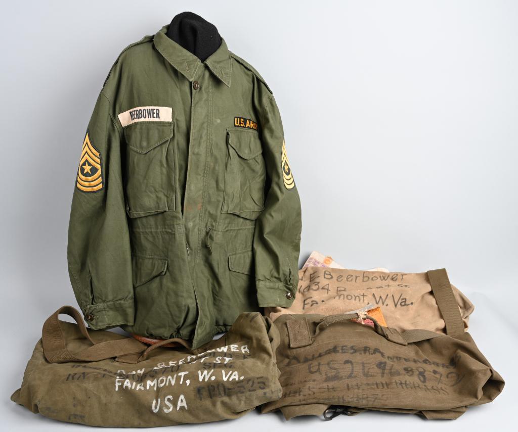 WWII NAMED DUFFLE BAGS AND JACKET AIRBORNE: WWII to Korea grouping named to Harold E. Beerbower of the 187th Glider Infantry, 11th Airborne. Harold served in WWII, Korea and Vietnam. This set of duffel bags, coat and several other articles from