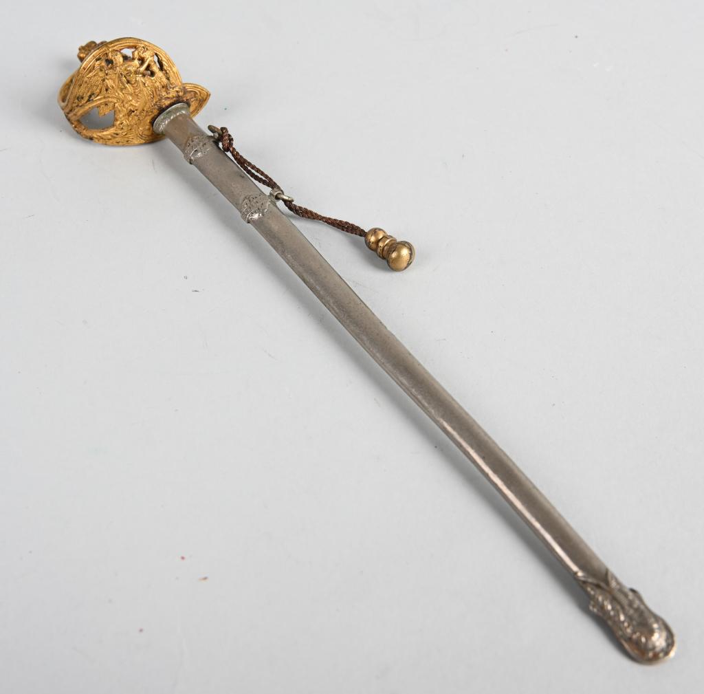 WW1 IMPERIAL GERMAN KAISER HONOR MINIATURE SWORD: This fine miniature measures about 11 inches in length. It is a copy of an Honor Sword that was made for the Kaiser circa 1895. The large counterpart resides today in the Klingen Museum in Solingen. T