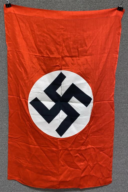 WWII NAZI GERMAN NSDAP FLAG 30X47 INCHES MINT: Multi-piece cotton construction banner approximately 30 x 47 inches. To both its red fields are sewn are white disks with a printed mobile swastikas in black. MINT Probably one of the most recognizabl