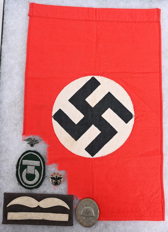 WWII NAZI GERMAN INSIGNIA LOT OF 6: Lot of 6 Nazi German insignia lot including 1) small NSDAP multi piece constructed flag made of red cotton with a separately applied white disk with a printed mobile swastika. Flag has a large section