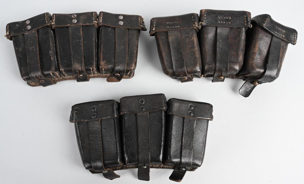 WWII NAZI GERMAN K98 AMMO POUCHES LOT OF 3: Lot of three blackened pebbled leather construction, three compartment ammo pouches. one being Rb.#ed and all three are in excellent condition. The K98 rifle evolved from the WWI Mauser Gew 98 model w