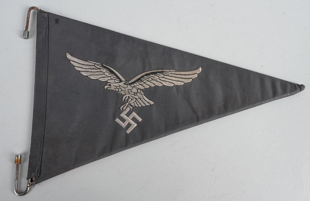 WWII NAZI GERMAN LUFTWAFFE OFFICERS CAR PENNANT: Roughly, 23cm tall at the hoist end, 40cm long, horizontal, isosceles triangle, woven, dual-ply, Luftwaffe blue/gray cotton construction pennant features a nicely detailed, machine embroidered, second