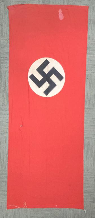 WWII NAZI GERMAN NSDAP WALL BANNER: Multi-piece cotton construction banner approximately 60 X 144. To both its red fields are sewn an 28 inch diameter white disks, with a printed mobile swastikas in black. Shows the expected period use 