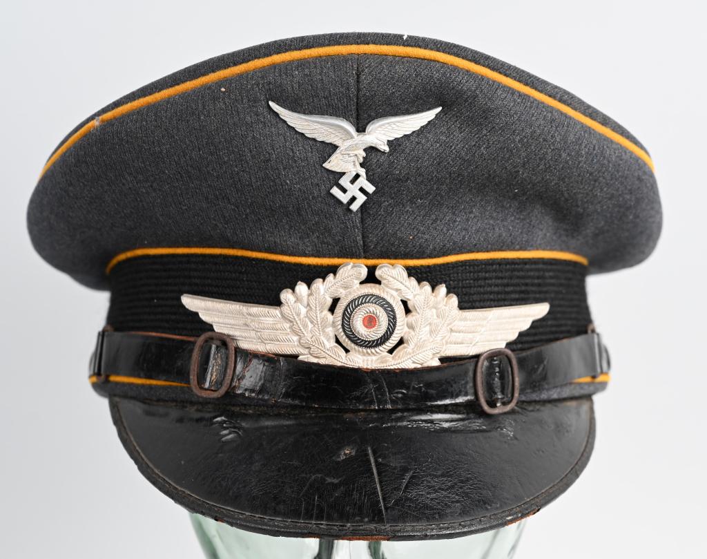 WWII NAZI GERMAN FLIGHT EM/NCO'S VISOR CAP: Nice quality private purchased Luftwaffe blue/gray, wool/tricot blend construction visor cap, features a black, horizontally ribbed interwoven mohair centerband and golden yellow wool waffenfarbe pipi