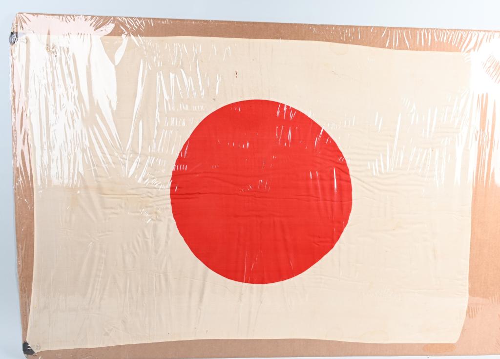 WWII JAPANESE NATIONAL LARGE SILK FLAG: Large WWII Japanese national flag being made of printed silk and measuring 41 X 28 inches and in excellent condition. with reinforced lather tabs on the hoist corners.