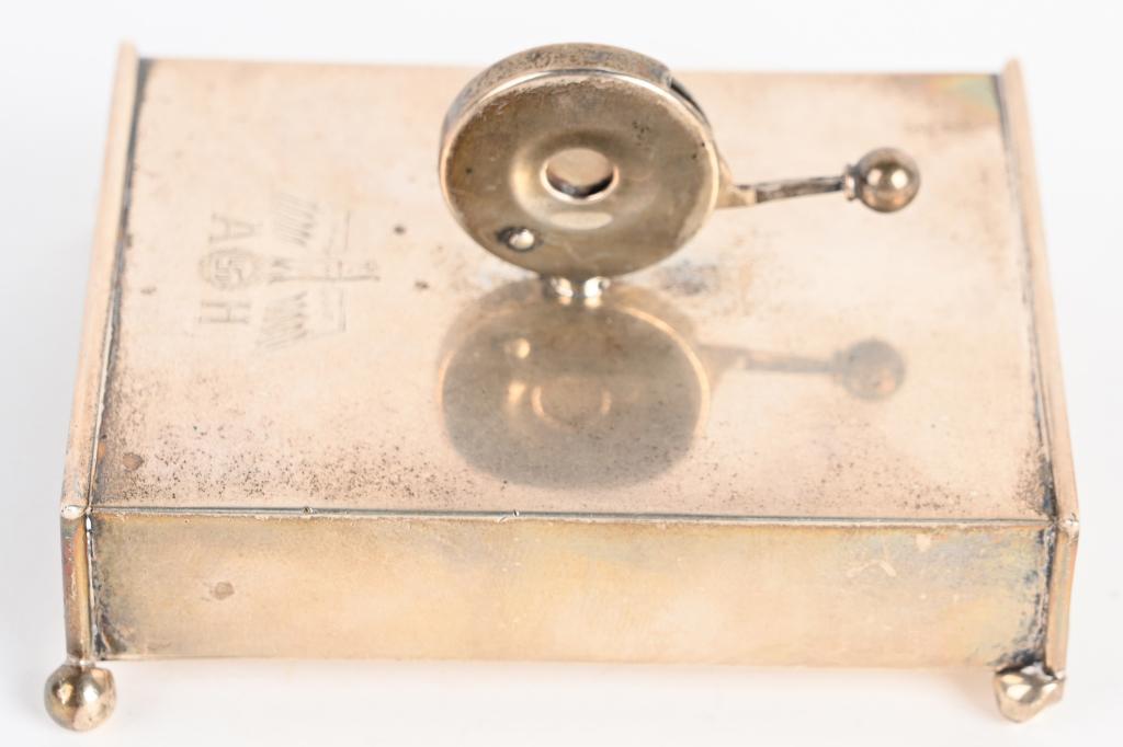WWII NAZI ADOLF HITLER CIGAR CUTTER BY WELLNER: Adolf Hitler Cigar Cutter from his Personal Table Service. A silver cigar cutter and matchbox case. Polished, smooth surfaces, elevated edges, spherical feet. Cutting mechanism on top and has the nati
