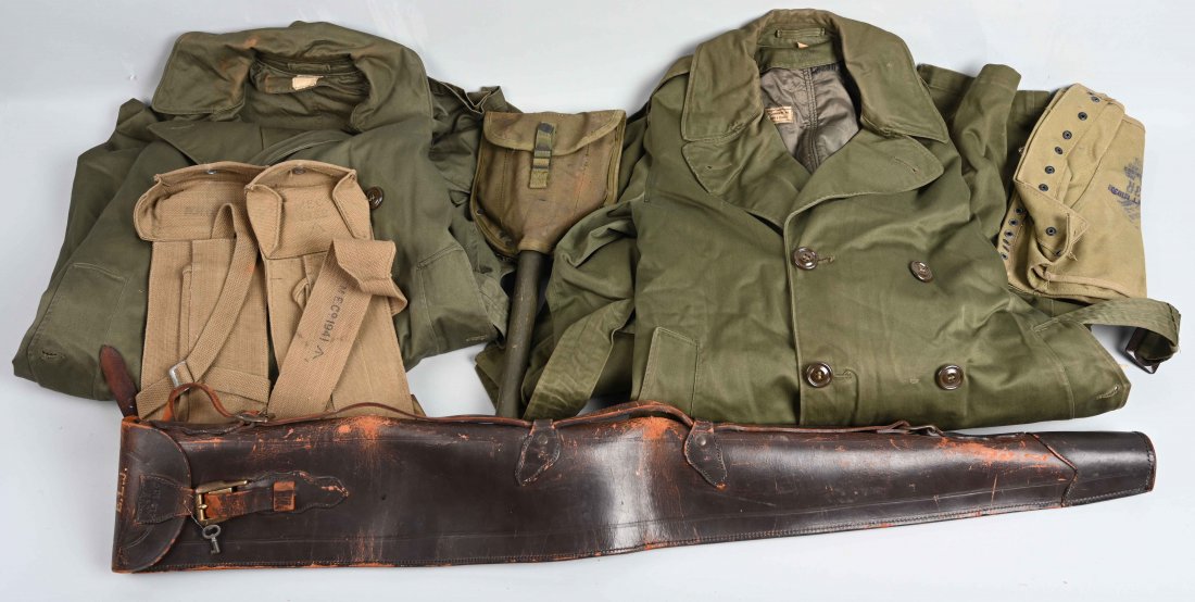 WWII-KOREAN WAR US & BRITISH MILITARIA SHOVEL COAT: Lot includes 2 Korean War era US issue trench coats, One size Small and one size Medium; a British sword carrier, leather, and unit marked; a 1966 dated British folding shovel with broad arrow proof m