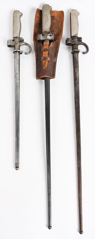 3 FRENCH LEBEL MILITARY RIFLE BAYONES: Lot includes a French Model 1886 / 91 / 16 / 35 Lebel bayonet with silver alloy handle and quillion - 18" short model. Also includes a French 1886 / 93 / 16 Lebel bayonet with silver alloy removable h