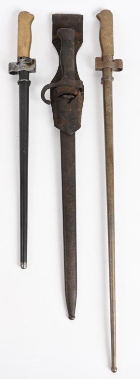 3 FRENCH LEBEL MILITARY RIFLE BAYONES: Lot includes a French Model 1886 / 91 / 16 / 35 Lebel bayonet with brass handle -- short 18" model. Also, a French Model 1892 Mannlicher Berther, First pattern bayonet with composition grips, hooked q
