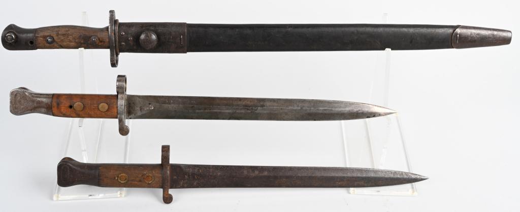 3 EARLY BRITISH MILITARY BAYONETS LEE METFORD SMLE: Three British military rifle bayonets. Mark I, 2nd Type Lee Metford and Mark II Lee Metford bayonet, both Model 1888, neither has a scabbard. Blades measure approximately 12.1" and 16.75" overall. Als