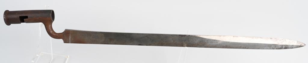BRITISH BROWN BESS SABER BAYONET ca. 1795: Unmarked British socket bayonet, for Brown Bess style musket. 22" blade, 27" overall length. Shows age wear on the underside of the socket, and service wear near the pommel. Very Good
