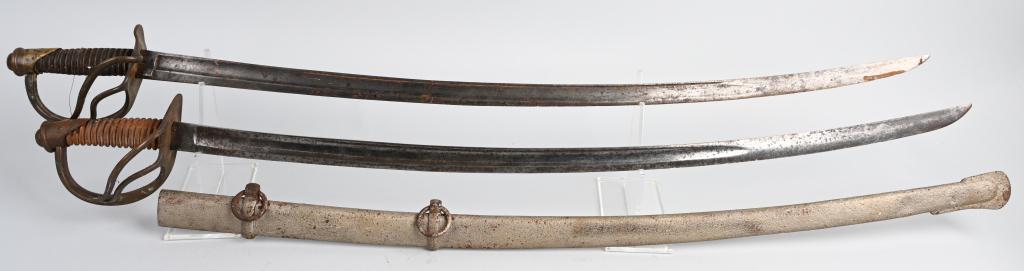 2 CIVIL WAR ERA CAVALRY SWORDS: Pair of Civil War era / 19th Century military swords. One is missing the scabbard and the grips and has a bent guard which is very loose and held on by wire, the other has a repainted scabbard and bar