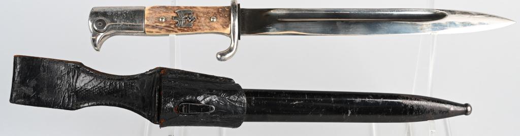 WWII NAZI GERMAN STAG HANDLE DRESS BAYONET: Roughly, 9 3/4 long, nickel/silver plated, drop forged, steel construction blade with wide fullers to each side. The blade is still quite clean and bright. The ricasso is well marked with impressed ma