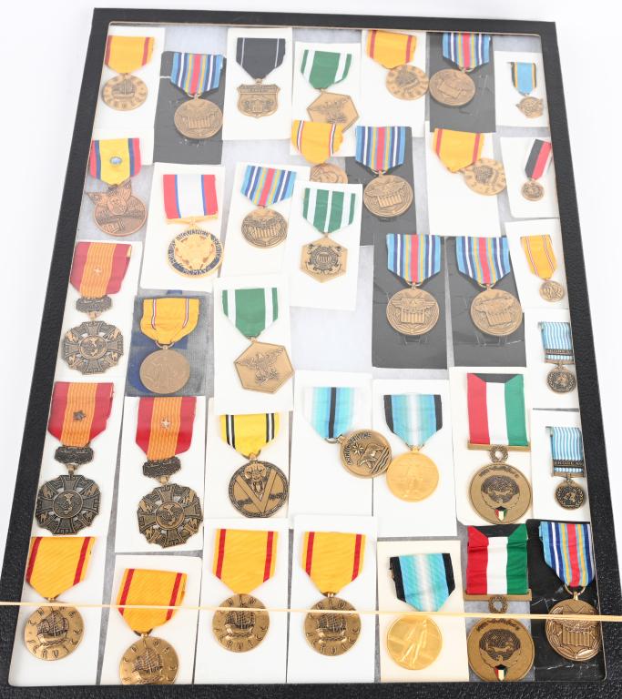 LARGE LOT OF 36 US MILITARY MEDALS: Large lot of 36 medals for the US military. All medals are newer except for 1 American Defense medal. Most of the medals included are War on Terrorism, Korean War, Republic of Vietnam, American Defens