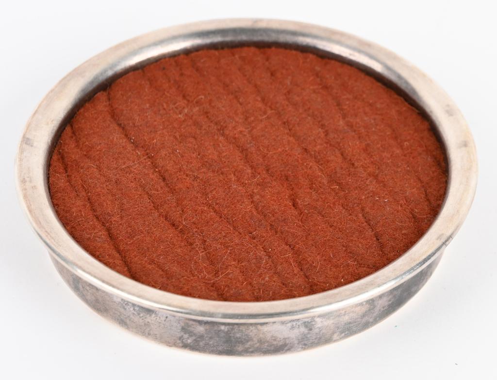 ADOLF HITLER FORMAL WINE COASTER BY WELLNER: Adolf Hitler formal serving coaster measuring about 4 inches and complete and intact. Manufactured and marked by the firm of Wellner and bears the initials of Hitler. Near Mint Adolf Hitler 20 April 1