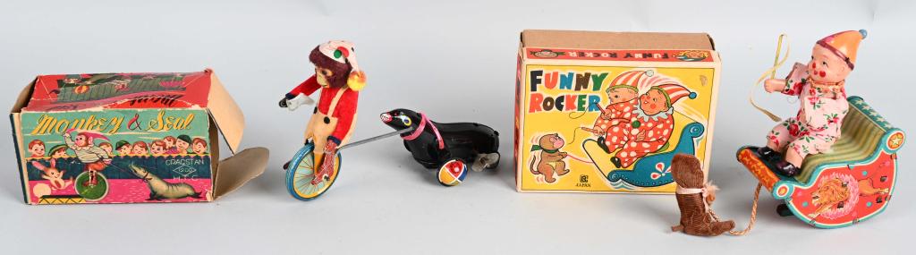 2- JAPAN WINDUP CIRCUS MONKEY TOYS MIB: Includes Funny Rocker Clown and Monkey all original and working. Plus Monkey and Seal all original and working. Both boxed. Largest 5 1/2" Excellent