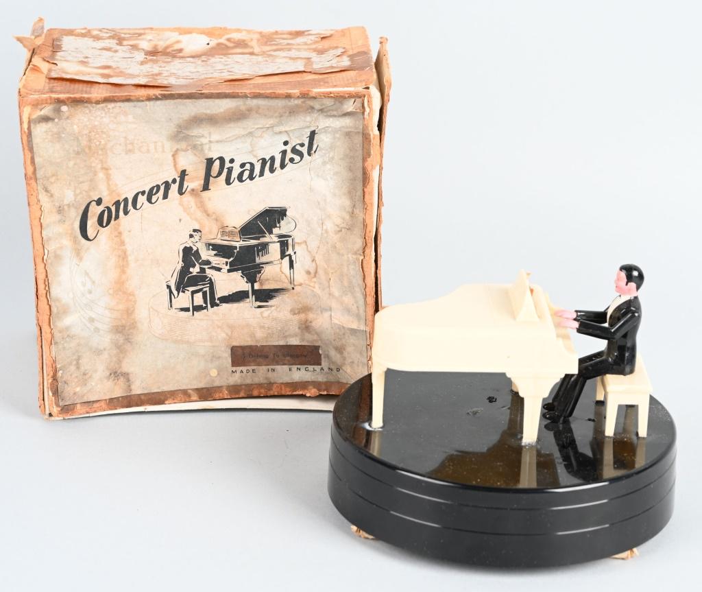 ENGLAND WINDUP CONCERT PIANIST w/ BOX: All original and man plays the piano and music plays. Boxed 7" Excellent