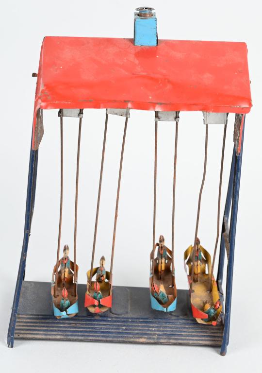 GERMAN TIN SWING TOY: All original. Pull top to activate the swinging boats. Needs adjustment. 9" Very Good
