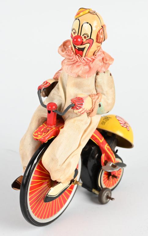 TPS TIN WINDUP CLOWN ON HIGHWHEEL BIKE: All original and works. 7" Excellent