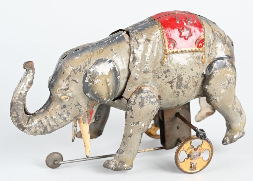 GERMAN TIN WINDUP HAND PAINTED CIRCUS ELEPHANT: Very detailed tin windup Circus Elephant. Windup works. 7" Very Good