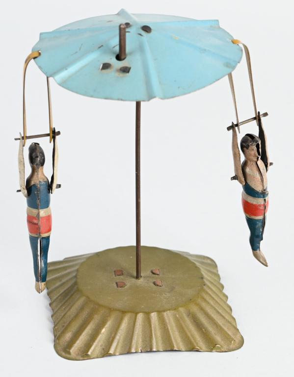 GERMAN TIN WINDUP ACROBAT GO ROUND: All original and complete. Windup works. 6" Excellent
