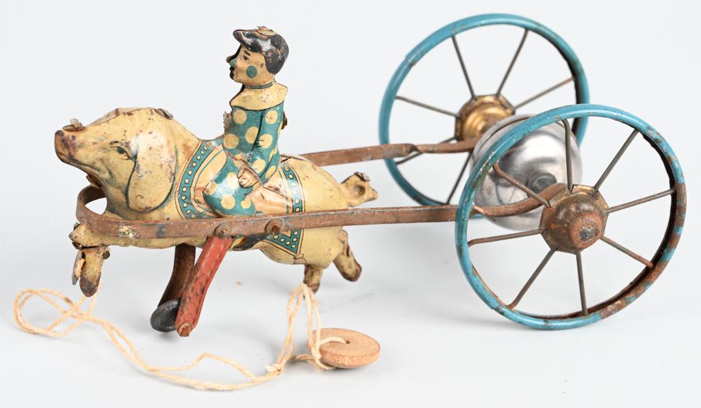 GERMAN TIN CLOWN RIDING PIG PULL TOY: All original unusual toy. 8" Very Good