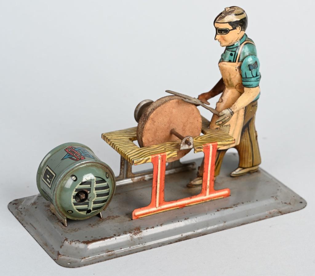 ARNOLD STEAM TOY ACCESSORY MAN AT GRINDER: Original steam toy accessory. Man at grinding wheel. All original. 6" Excellent
