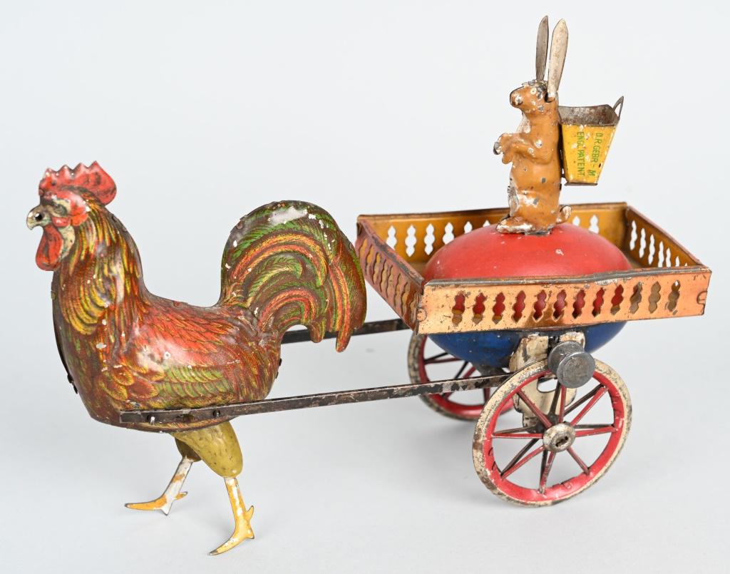LEHMANN FLYWHEEL DUO ROOSTER & RABBIT: Nice early Lehmann Duo with the flywheel mech. Version with grate around the egg. Nice all original example. 7 1/2" Excellent