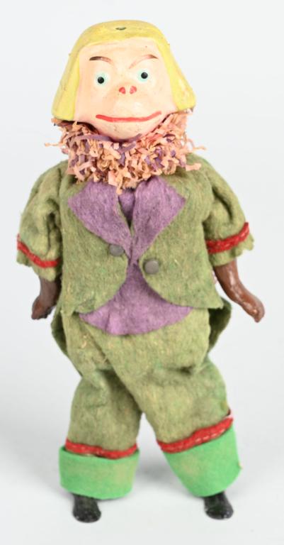GERMAN WINDUP COMPOSITION MONKEY w/ LEAD FEET: All original felt dressed composition monkey with lead feet. Windup works. 8 1/2" Excellent