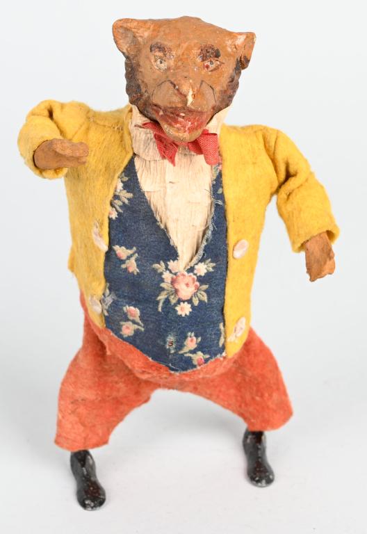 GERMAN WINDUP COMPOSITION BEAR w/ LEAD FEET: All original felt dressed composition bear with lead feet. Windup works. 8 1/2" Excellent