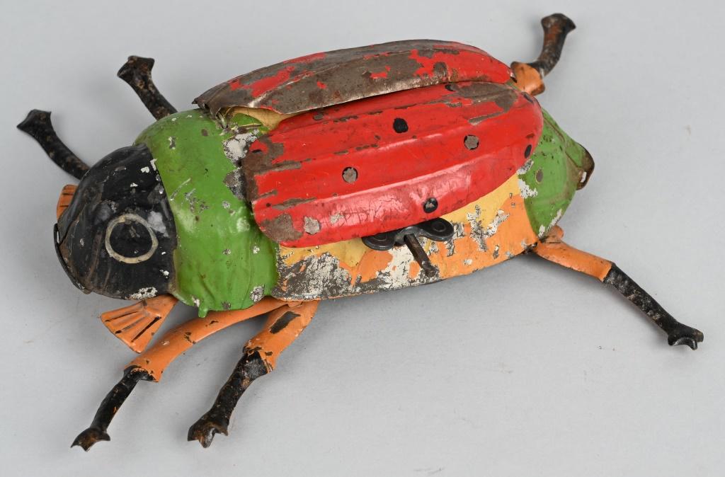 GERMAN TIN WINDUP HAND PAINTED BEETLE: All original with nice colors. Works. 7" Very Good