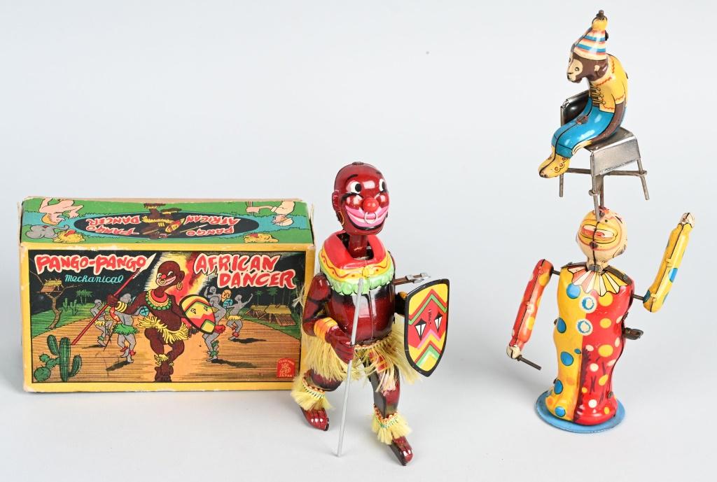 TPS PANGO PANGO & CLOWN JUGGLER: Includes Pango Pango windup works missing spear tip and boxed. And Clown juggling monkey on chair works. Largest 8" Excellent