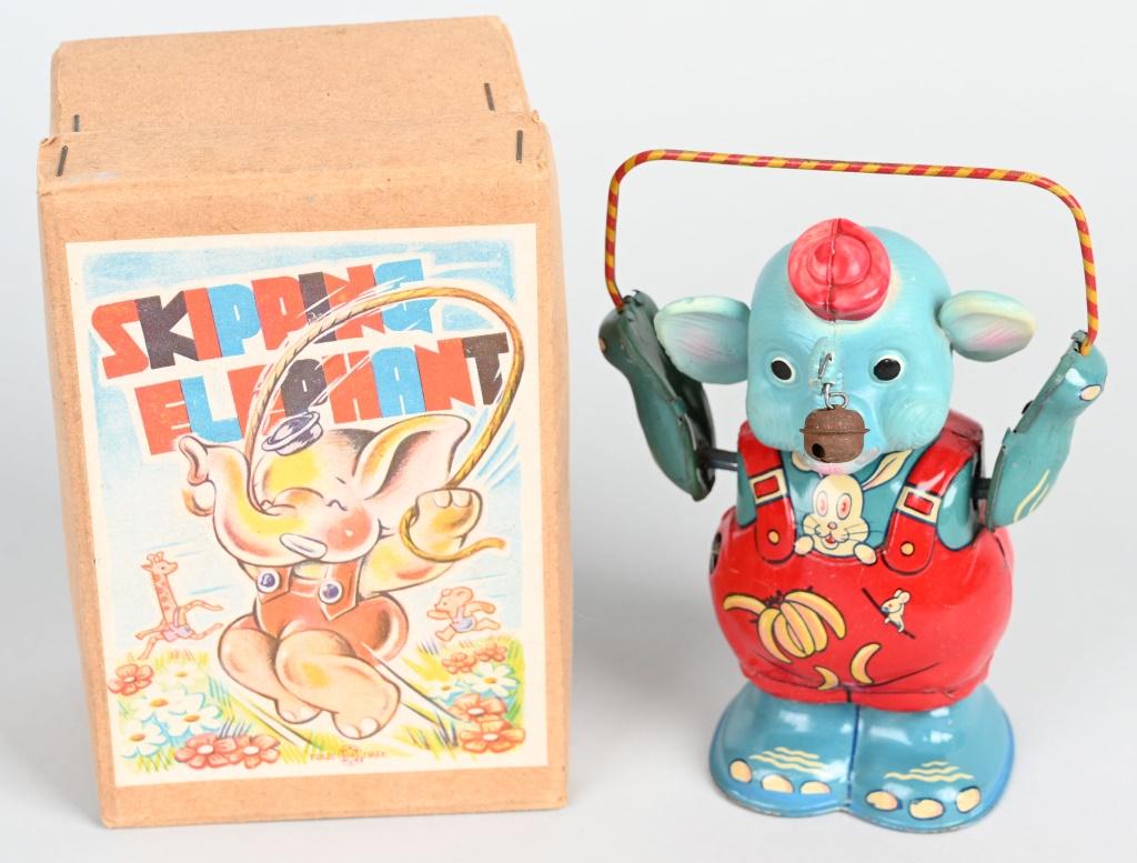 JAPAN TIN WINDUP SKIPPING ELEPHANT w/ BOX: All original and complete. Great colors. Works. 6" Excellent