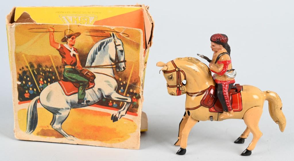 GERMAN TIN WINDUP PIONEER ON HORSE w/ BOX: All original and looks never played with. Works. Boxed 4" Excellent