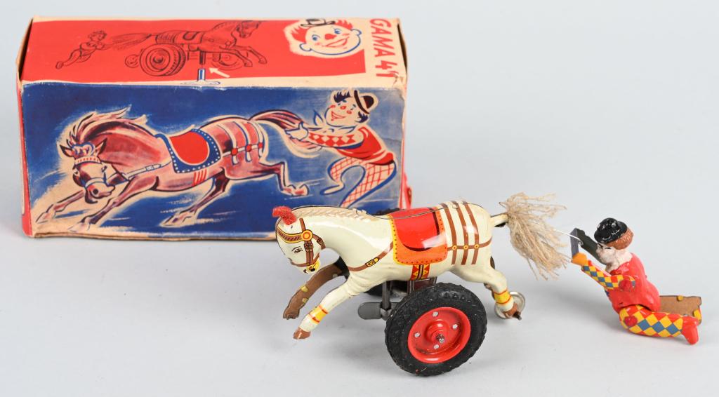 GAMA TIN WINDUP CLOWN WITH HORSE w/ BOX: All original and complete. Works. Boxed 7" Excellent