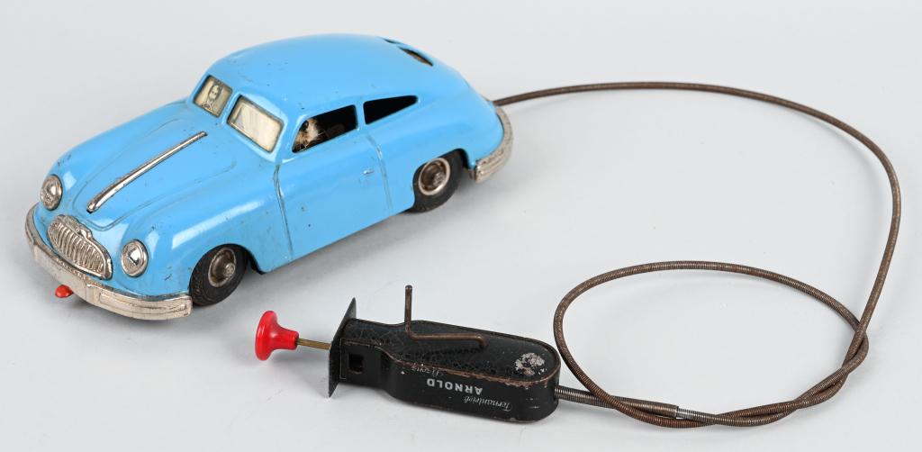 ARNOLD REMOTE CONTROL PORSCHE: All original and complete with remote. Works. 8 1/2" Excellent