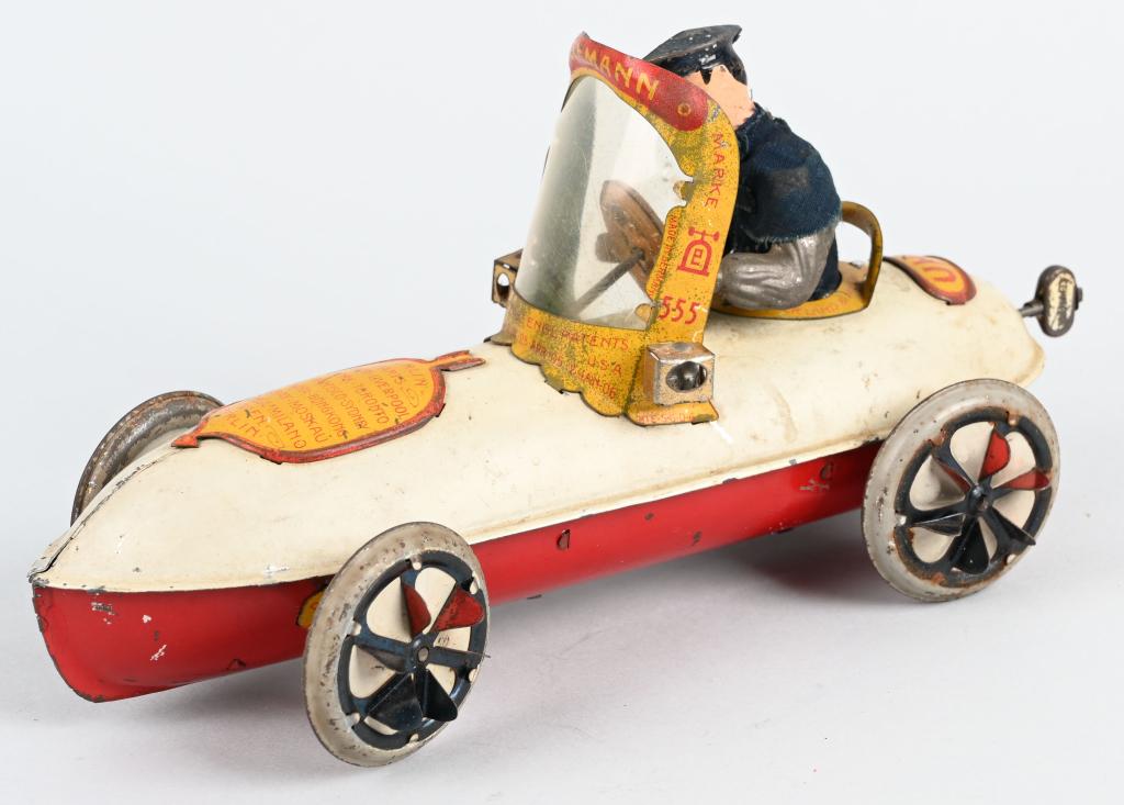 LEHMANN TIN WINDUP UHU AMPHIBIUS CAR: Wonderful Lehmann tin windup Amphibius Car. All original and complete. Very nice action with moving driver. 9 1/2" Excellent